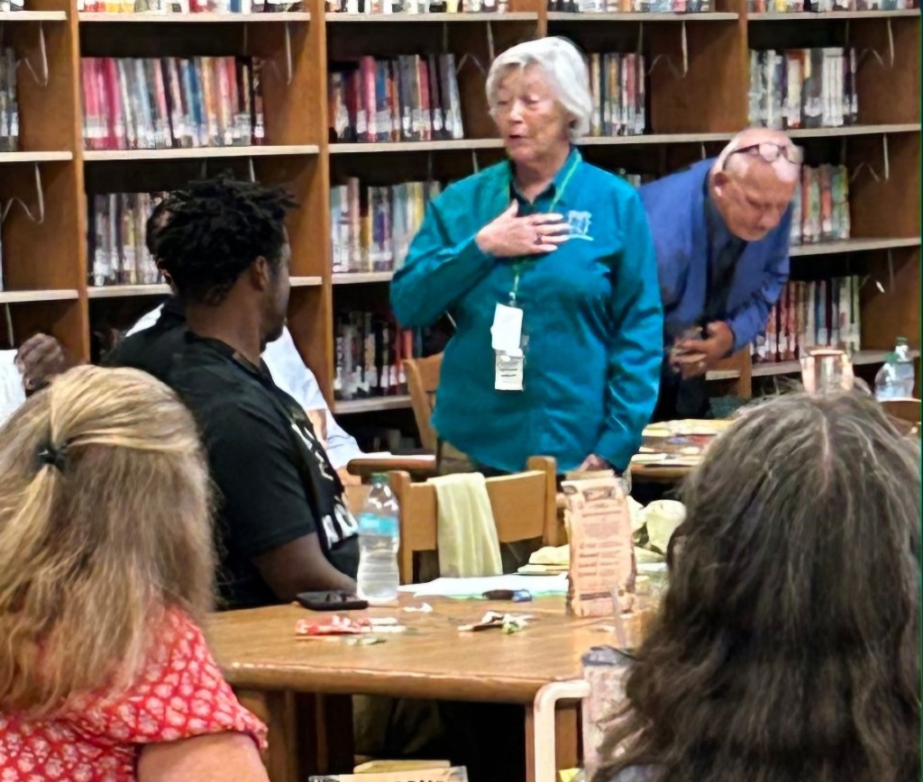 Linda Sanborn talking with Milton High School faculty, August 3, 2026, about the DUO Organization and how important their role is as principal and staff in identifying and helping to meet the critical needs of children in their school.